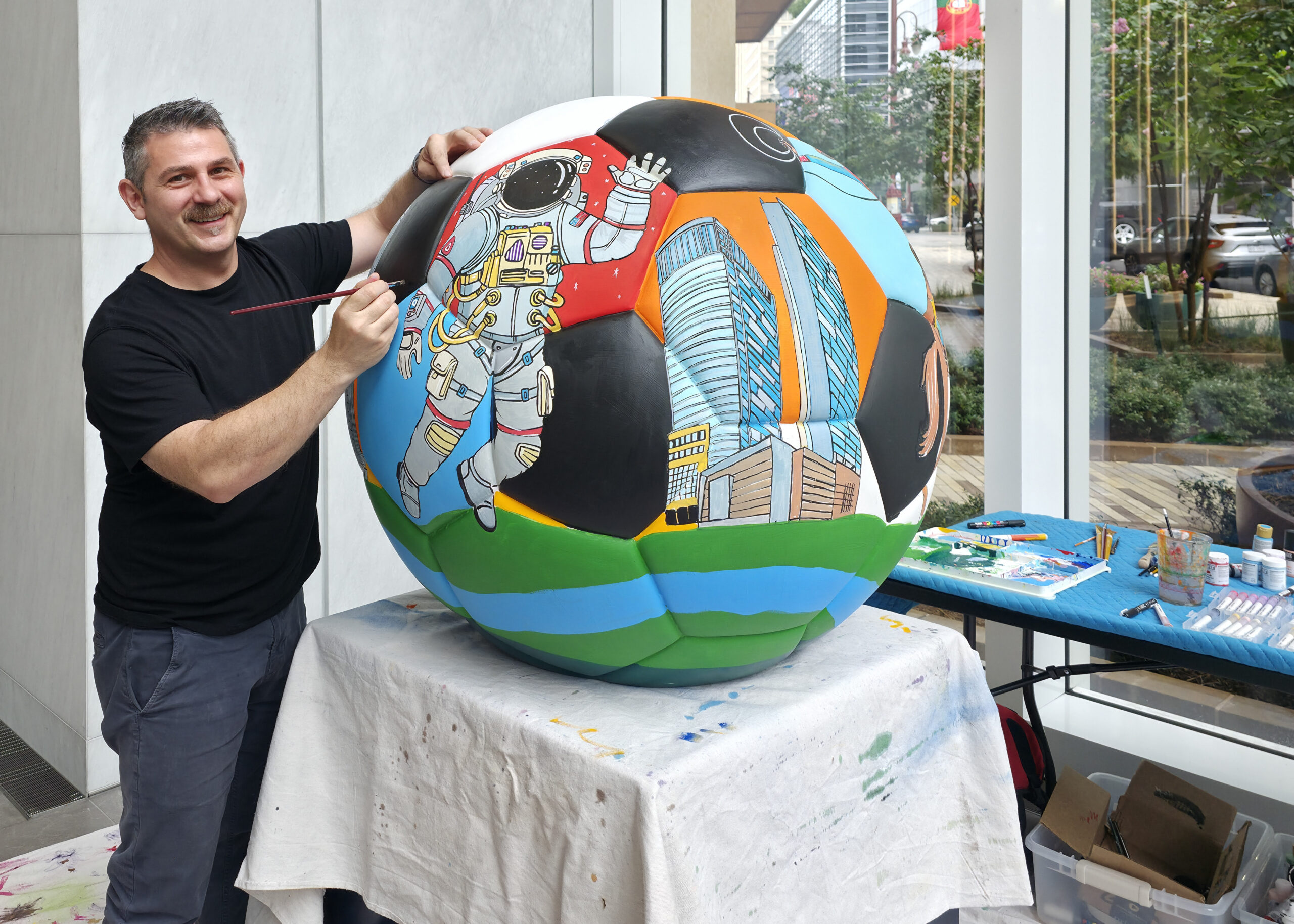 Houston Artist Bogdan Mihai Creates Monumental Soccer Ball Installation at Texas Tower Ahead of World Cup Events